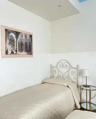 Letto o letti in una camera di Casa Paradiso