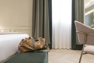 Letto o letti in una camera di Hotel La Gemma