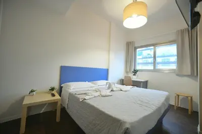 Letto o letti in una camera di Garden Blue