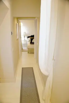 Letto o letti in una camera di White Florence Suite