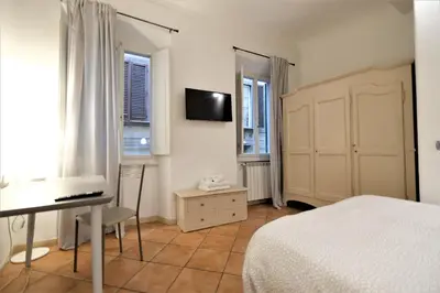 Letto o letti in una camera di Wine Apartments Florence Dolcetto