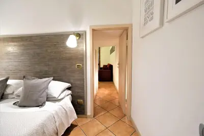 Letto o letti in una camera di Wine Apartments Florence Dolcetto