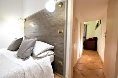 Letto o letti in una camera di Wine Apartments Florence Dolcetto