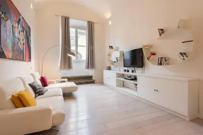 TV o dispositivi per l'intrattenimento presso Le Grazie Luxury Apartment by Mmega