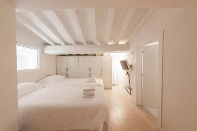 Letto o letti in una camera di Le Grazie Luxury Apartment by Mmega