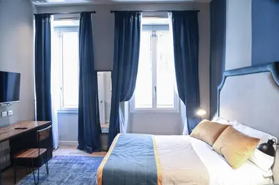 Letto o letti in una camera di Ricasoli Boutique