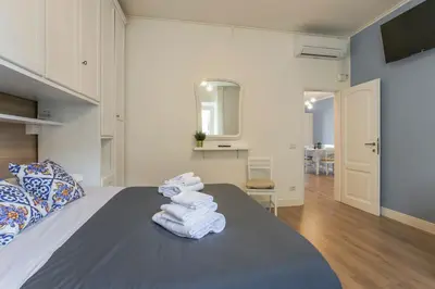 Letto o letti in una camera di SANZANOBI Suite in Central Florence