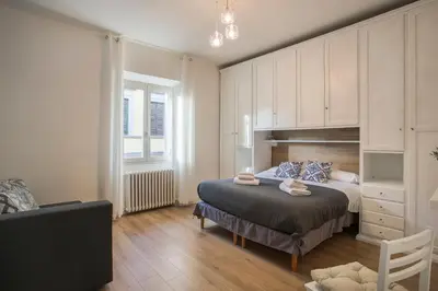 Letto o letti in una camera di SANZANOBI Suite in Central Florence