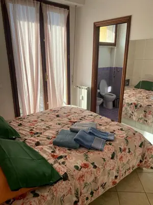 Letto o letti in una camera di Golden Lungarno River