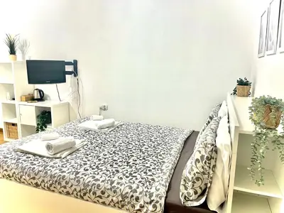 Letto o letti in una camera di Florence Green Apartment