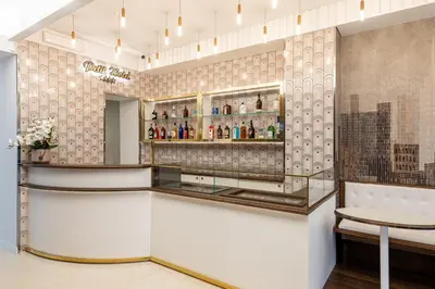 Salone o bar di Petit Hotel