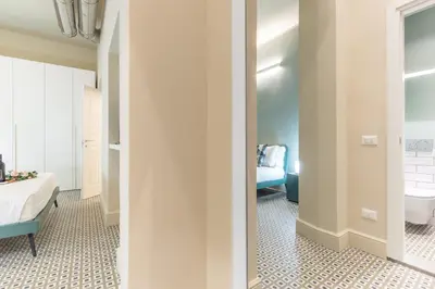 Letto o letti in una camera di Cavour Five Senses