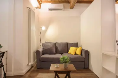 Area soggiorno di Oltrarno Suite in Florence