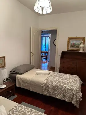 Letto o letti in una camera di Casa Maria (posto auto gratuito)