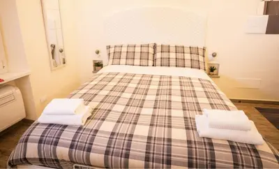 Letto o letti in una camera di Suite 