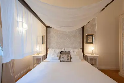 Letto o letti in una camera di Giotto Suite With View
