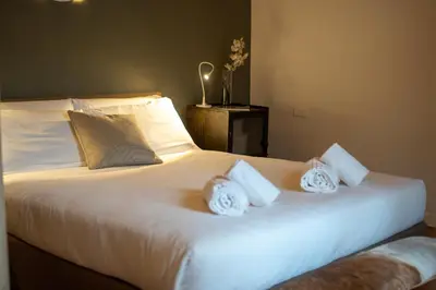 Letto o letti in una camera di Urban Retreat