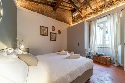 Letto o letti in una camera di Urban Retreat