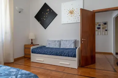Letto o letti in una camera di The Art Gallery