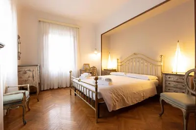Letto o letti in una camera di Palazzo Cecchi Florentine Apartment