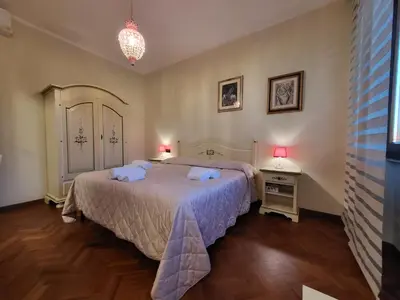 Letto o letti in una camera di Residenza del Roster