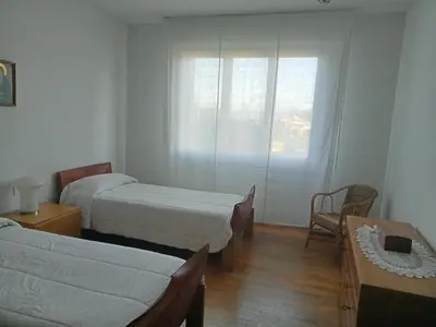 Letto o letti in una camera di Residenza Relax Quinto Alto Sesto Fiorentino Firenze