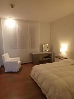 Letto o letti in una camera di Residenza Relax Quinto Alto Sesto Fiorentino Firenze
