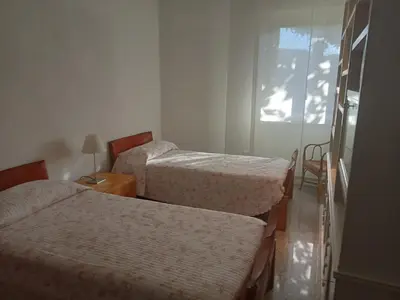 Letto o letti in una camera di Residenza Relax Quinto Alto Sesto Fiorentino Firenze