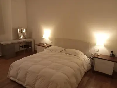 Letto o letti in una camera di Residenza Relax Quinto Alto Sesto Fiorentino Firenze