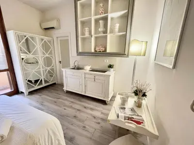 Letto o letti in una camera di Charming Studio next to the Duomo