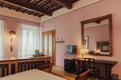 Letto o letti in una camera di II Guelfo Bianco