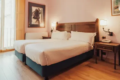 Letto o letti in una camera di II Guelfo Bianco