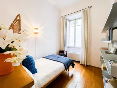 Letto o letti in una camera di Stile & comfort near P. Signoria
