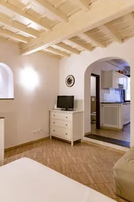 Letto o letti in una camera di Lovely portion of property few steps from Basilica Santa Croce