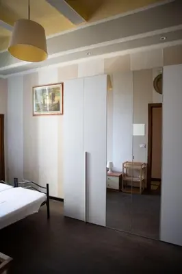 Letto o letti in una camera di Nice Apartment Near The Basilica Of San Lorenzo