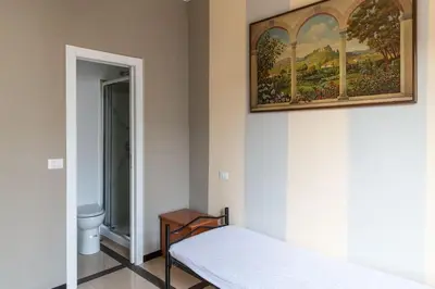 Letto o letti in una camera di Nice Apartment Near The Basilica Of San Lorenzo