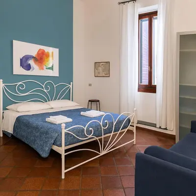 Letto o letti in una camera di Conti apartment