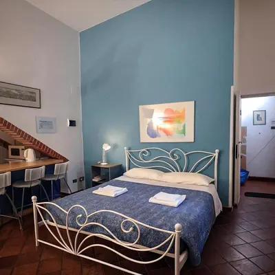 Letto o letti in una camera di Conti apartment