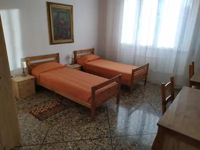 Letto o letti in una camera di Grande casa vicina al centro