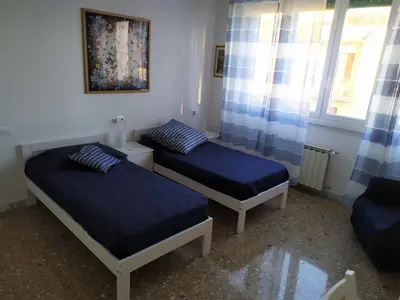 Letto o letti in una camera di Grande casa vicina al centro