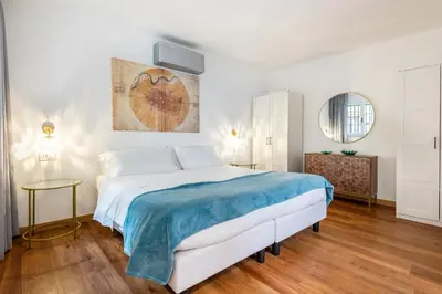 Letto o letti in una camera di Vasari Apartment