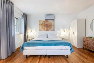 Letto o letti in una camera di Vasari Apartment