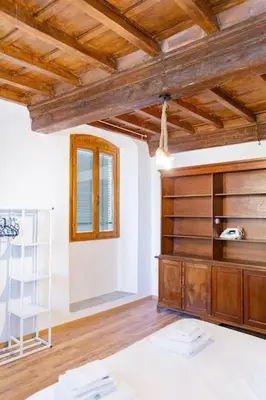 Letto o letti in una camera di Sweet Apartment Near Piazza Pitti