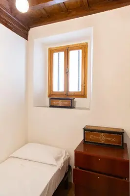 Letto o letti in una camera di Sweet Apartment Near Piazza Pitti