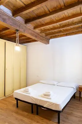 Letto o letti in una camera di Sweet Apartment Near Piazza Pitti