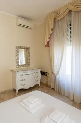 Letto o letti in una camera di Classic 1BR Outside ZTL & 10 min from Center