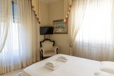 Letto o letti in una camera di Classic 1BR Outside ZTL & 10 min from Center