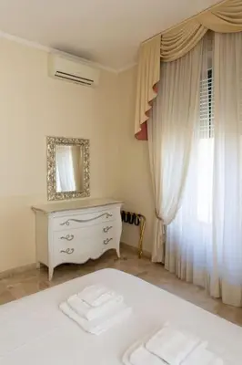 Letto o letti in una camera di Classic 1BR Outside ZTL & 10 min from Center