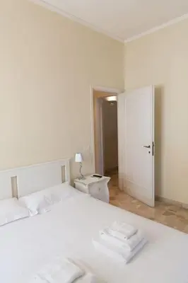 Letto o letti in una camera di Classic 1BR Outside ZTL & 10 min from Center