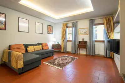 Area soggiorno di Borgo La Croce Apartment